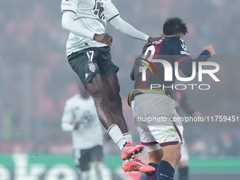 Wilfried Singo of AS Monaco and Santiago Castro of Bologna FC jump for the ball during the UEFA Champions League 2024/25 League Phase MD4 ma...