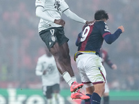 Wilfried Singo of AS Monaco and Santiago Castro of Bologna FC jump for the ball during the UEFA Champions League 2024/25 League Phase MD4 ma...