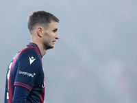 Stefan Posch of Bologna FC looks on during the UEFA Champions League 2024/25 League Phase MD4 match between Bologna FC and AS Monaco at Stad...