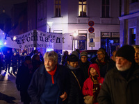 People attend a march commemorating the 65th anniversary of the Night of Broken Glass (Kristallnacht) in  Berlin, Germany on November 9th, 2...