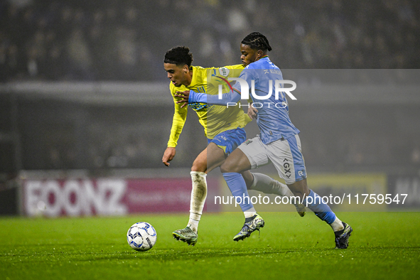 RKC midfielder Daouda Weidmann and NEC forward Sontje Hansen participate in the match between RKC and NEC at the Mandemakers Stadium for the...