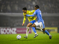 RKC midfielder Daouda Weidmann and NEC forward Sontje Hansen participate in the match between RKC and NEC at the Mandemakers Stadium for the...