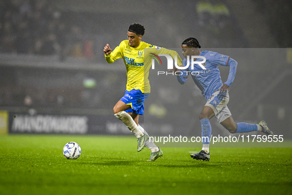 RKC midfielder Daouda Weidmann and NEC forward Sontje Hansen participate in the match between RKC and NEC at the Mandemakers Stadium for the...