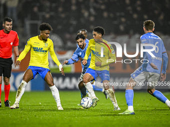 RKC defender Godfried Roemeratoe, RKC midfielder Daouda Weidmann, and NEC midfielder Roberto Gonzalez Bayon participate in the match between...