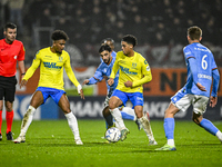 RKC defender Godfried Roemeratoe, RKC midfielder Daouda Weidmann, and NEC midfielder Roberto Gonzalez Bayon participate in the match between...