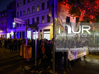 People attend a march commemorating the 65th anniversary of the Night of Broken Glass (Kristallnacht) in  Berlin, Germany on November 9th, 2...