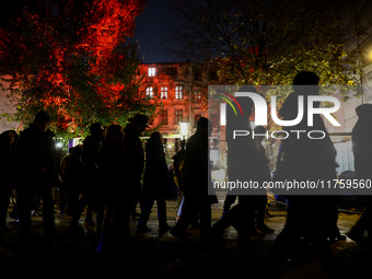 People attend a march commemorating the 65th anniversary of the Night of Broken Glass (Kristallnacht) in  Berlin, Germany on November 9th, 2...