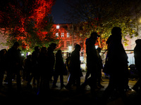 People attend a march commemorating the 65th anniversary of the Night of Broken Glass (Kristallnacht) in  Berlin, Germany on November 9th, 2...