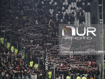 Torino supporters cheer during the Serie A football match number 12, Juventus versus Torino, at the Allianz Stadium in Turin, Piedmont, Ital...