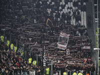 Torino supporters cheer during the Serie A football match number 12, Juventus versus Torino, at the Allianz Stadium in Turin, Piedmont, Ital...