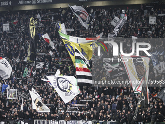 Juventus supporters cheer during the Serie A football match number 12, Juventus vs. Torino, at the Allianz Stadium in Turin, Italy, on Octob...