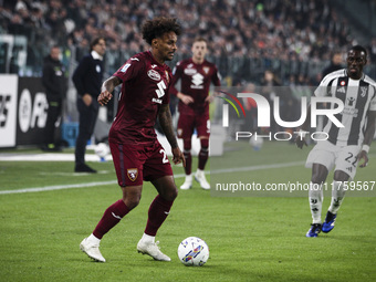 Torino defender Saul Coco (23) is in action during the Serie A football match number 12, Juventus vs. Torino, at the Allianz Stadium in Turi...