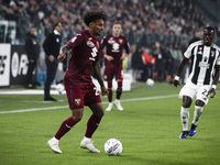 Torino defender Saul Coco (23) is in action during the Serie A football match number 12, Juventus vs. Torino, at the Allianz Stadium in Turi...