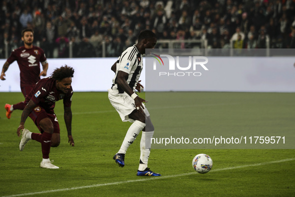 Juventus midfielder Timothy Weah (22) scores his goal to make it 1-0 during the Serie A football match number 12, Juventus vs. Torino, at th...