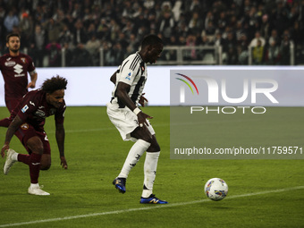 Juventus midfielder Timothy Weah (22) scores his goal to make it 1-0 during the Serie A football match number 12, Juventus vs. Torino, at th...