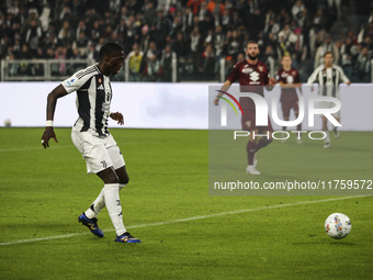 Juventus midfielder Timothy Weah (22) scores his goal to make it 1-0 during the Serie A football match number 12, Juventus vs. Torino, at th...