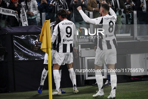 Juventus midfielder Timothy Weah (22) celebrates with his teammates after scoring his goal to make it 1-0 in the Serie A football match numb...