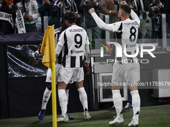 Juventus midfielder Timothy Weah (22) celebrates with his teammates after scoring his goal to make it 1-0 in the Serie A football match numb...