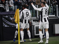 Juventus midfielder Timothy Weah (22) celebrates with his teammates after scoring his goal to make it 1-0 in the Serie A football match numb...