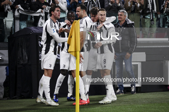 Juventus midfielder Timothy Weah (22) celebrates with his teammates after scoring his goal to make it 1-0 in the Serie A football match numb...