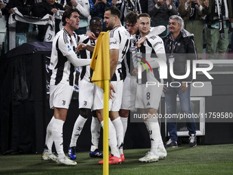 Juventus midfielder Timothy Weah (22) celebrates with his teammates after scoring his goal to make it 1-0 in the Serie A football match numb...