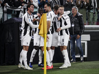 Juventus midfielder Timothy Weah (22) celebrates with his teammates after scoring his goal to make it 1-0 in the Serie A football match numb...