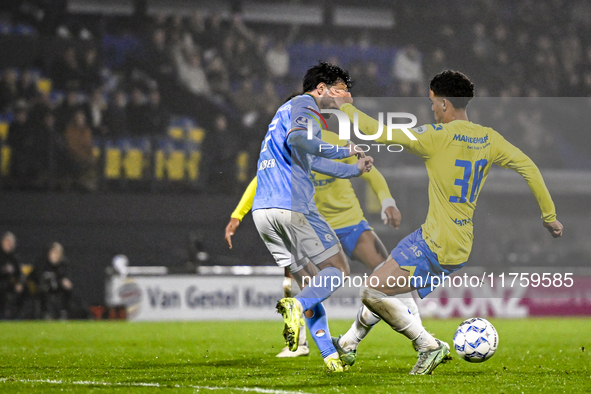 NEC midfielder Roberto Gonzalez Bayon and RKC midfielder Daouda Weidmann play during the match RKC vs. NEC at the Mandemakers Stadium in Waa...