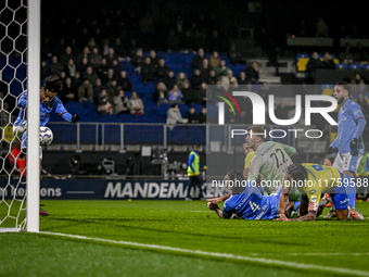 NEC midfielder Kosai Sano and NEC goalkeeper Robin Roefs participate in the match RKC - NEC at the Mandemakers Stadium for the 2024-2025 sea...