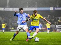 NEC midfielder Mees Hoedemakers and RKC midfielder Richard van der Venne play during the match RKC vs. NEC at the Mandemakers Stadium in Waa...