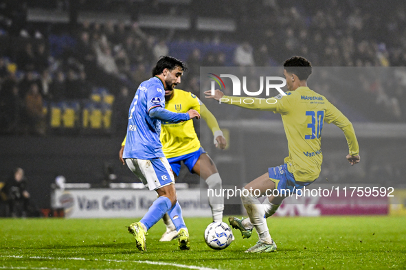 NEC midfielder Roberto Gonzalez Bayon and RKC midfielder Daouda Weidmann play during the match RKC vs. NEC at the Mandemakers Stadium in Waa...