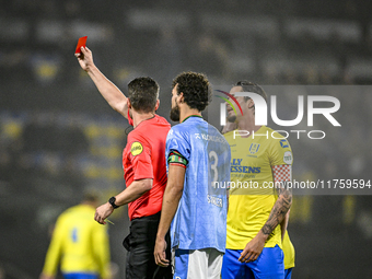 Referee Erwin Blank shows a red card to RKC midfielder Daouda Weidmann during the match between RKC and NEC at the Mandemakers Stadium in Wa...