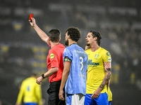 Referee Erwin Blank shows a red card to RKC midfielder Daouda Weidmann during the match between RKC and NEC at the Mandemakers Stadium in Wa...