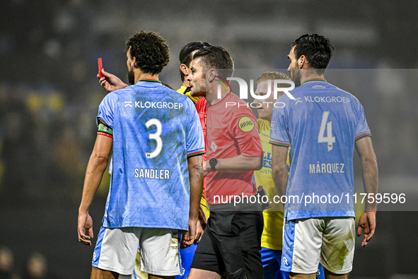 Referee Erwin Blank shows a red card to RKC midfielder Daouda Weidmann during the match between RKC and NEC at the Mandemakers Stadium in Wa...