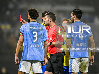 Referee Erwin Blank shows a red card to RKC midfielder Daouda Weidmann during the match between RKC and NEC at the Mandemakers Stadium in Wa...