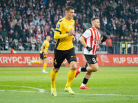 Arkadiusz Jedrych and Benjamin Kallman participate in the game between KS Cracovia and GKS Katowice in Krakow, Poland, on November 9, 2024....