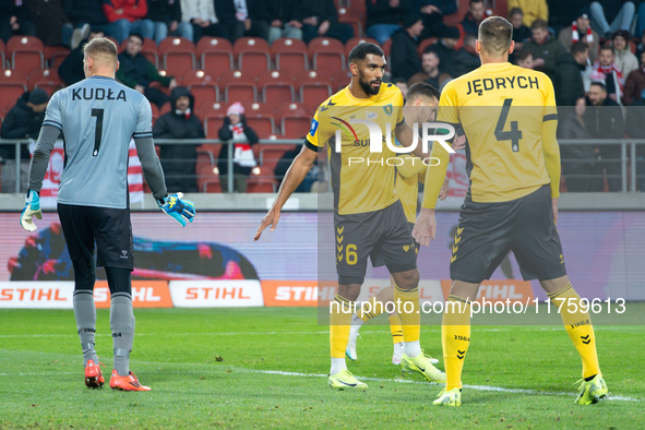 GKS Katowice players Dawid Kudla, Lukas Klemenz, and Arkadiusz Jedrych participate in the game between KS Cracovia and GKS Katowice in Krako...