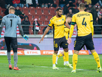 GKS Katowice players Dawid Kudla, Lukas Klemenz, and Arkadiusz Jedrych participate in the game between KS Cracovia and GKS Katowice in Krako...