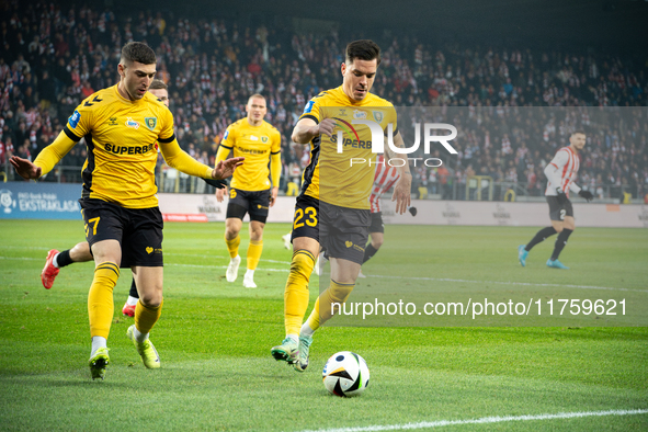 Marcin Wasielewski and Sebastian Bergier participate in the game between KS Cracovia and GKS Katowice in Krakow, Poland, on November 9, 2024...