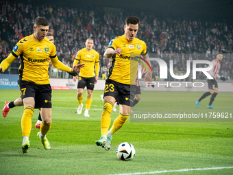 Marcin Wasielewski and Sebastian Bergier participate in the game between KS Cracovia and GKS Katowice in Krakow, Poland, on November 9, 2024...