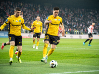 Marcin Wasielewski and Sebastian Bergier participate in the game between KS Cracovia and GKS Katowice in Krakow, Poland, on November 9, 2024...