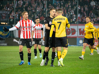 Players argue with referee Damian Sylwestrzak during the game between KS Cracovia and GKS Katowice in Krakow, Poland, on November 9, 2024. P...