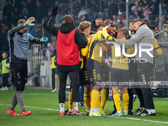 GKS Katowice players celebrate scoring a goal during the game between KS Cracovia and GKS Katowice in Krakow, Poland, on November 9, 2024. T...