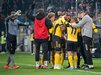 GKS Katowice players celebrate scoring a goal during the game between KS Cracovia and GKS Katowice in Krakow, Poland, on November 9, 2024. T...