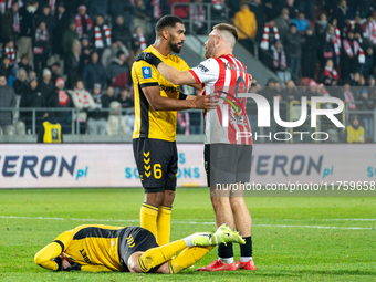 Lukas Klemenz and Benjamin Kallman participate in the game between KS Cracovia and GKS Katowice in Krakow, Poland, on November 9, 2024. This...