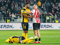 Lukas Klemenz and Benjamin Kallman participate in the game between KS Cracovia and GKS Katowice in Krakow, Poland, on November 9, 2024. This...