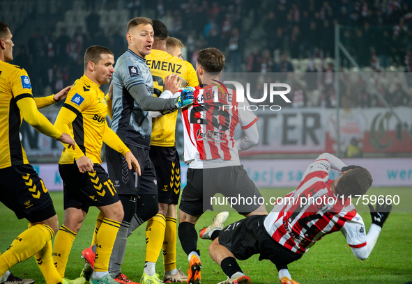 Players are involved in a scuffle during the game between KS Cracovia and GKS Katowice in Krakow, Poland, on November 9, 2024, at a PKO BP E...