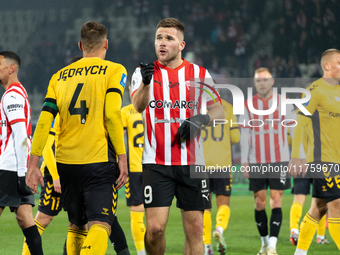 Benjamin Kallman and Arkadiusz Jedrych argue during the game between KS Cracovia and GKS Katowice in Krakow, Poland, on November 9, 2024. Th...