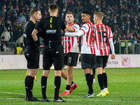 Cracovia players Benjamin Kallman, Amir Al-Ammari, and Bartosz Biedrzycki argue with referees during the game between KS Cracovia and GKS Ka...