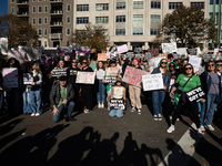 Hundreds take a agroup photos at the conclusion of a demonstration for reproductive rights outside The Heritage Foundation following the ele...