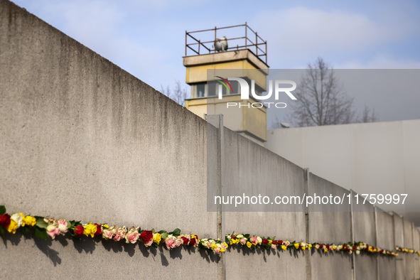 Flowers at Berlin Wall Memorial after the commemoration ceremony marking the 35th anniversary of the fall of the Berlin Wall. Berlin, German...